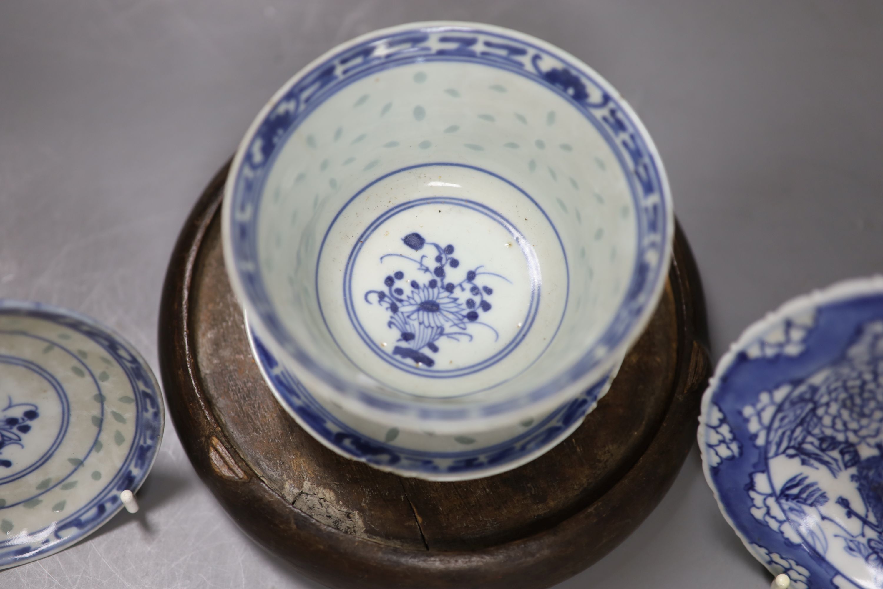 A group of Chinese blue and white wares, including a Chinese blue and white dish, a similar pedestal dish and a tea bowl and saucer, to